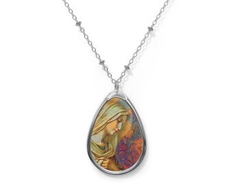 May include: Silver chain necklace with a teardrop-shaped pendant featuring a colorful image of the Virgin Mary and baby Jesus.