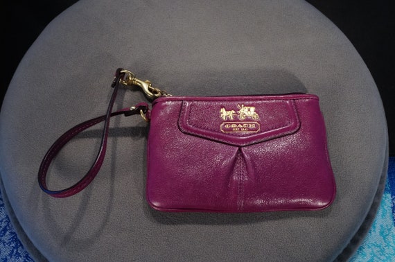 Purple leather coach purse deals