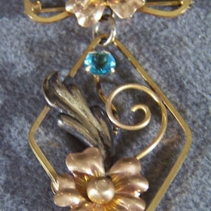 Vintage 12 K Rose Yellow Gold Filled Round Blue Topaz Floral Design Scrolled Art Deco Style Dangle Pin Brooch       **RL