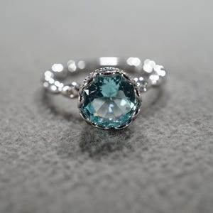 Vintage Wedding Band Stacker Design Ring Sterling Silver Round Prong Set Blue Topaz Raised Relief Single Stone Setting Classic Collectable 8