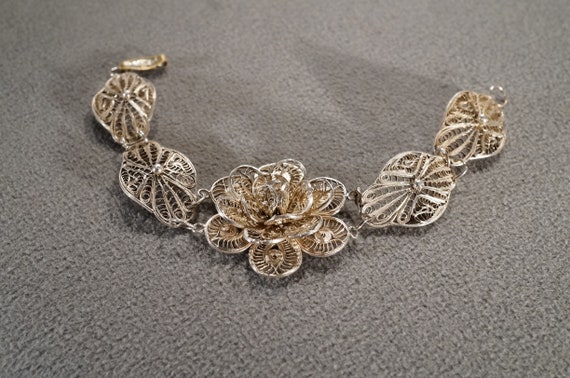 Flower Design Bracelet with Circles and Scrolled Links Sterling Silver Flower Design Bracelet with Circles and Scrolled Links Sterling Silver