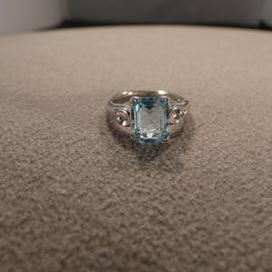 Vintage Wedding Band Stacker Design Ring Sterling Silver Rectangle Prong Set Blue Topaz Scrolled Raised Relief Single Stone Setting Size 7.5