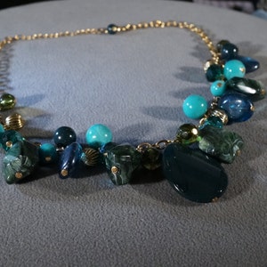 vintage gold tone necklace with huge lucite beads in assorted colors and shapes    M