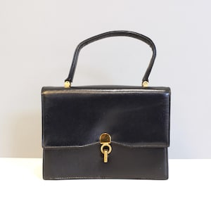Bolso de mano con asa superior de cuero azul marino Michels Drew vintage