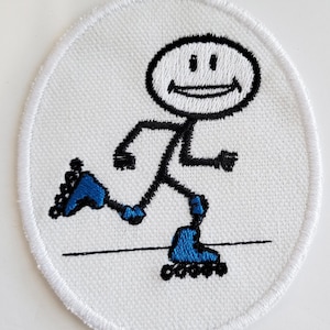 May include: White embroidered patch of a stick figure roller skating with a blue smile and blue roller skates.