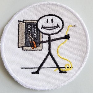 May include: White embroidered patch with a stick figure electrician holding a pair of pliers and a wire. The electrician is smiling and standing in front of a white electrical panel.