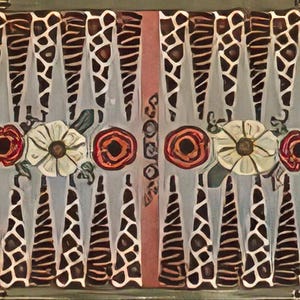 May include: An abstract painting featuring a symmetrical design. The artwork showcases vertical, elongated shapes with a giraffe-like pattern, complemented by floral elements in red, white, and orange. The background is a muted gray.