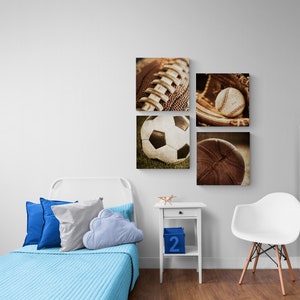 A Lineup of Four Sports Balls Including Baseball, Basketball, American