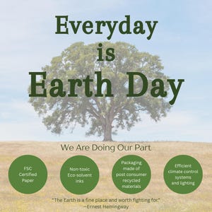 a poster with a tree in the middle of a field