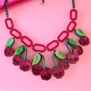 Skull cherry charm statement necklace