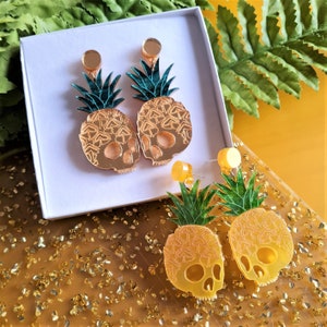 Pineapple skull dangle earrings
