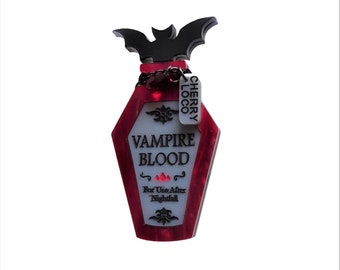 Vampire blood potion brooch