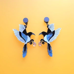 Two for joy magpie dangle earrings
