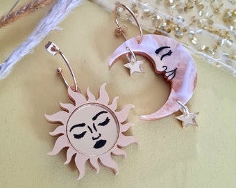 Sun and moon dangle earrings