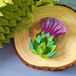 Thistle head brooch