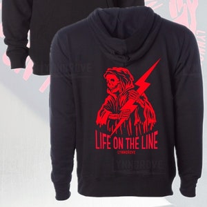 May include: Black hooded sweatshirt with a red graphic of a skeleton holding a lightning bolt. The text "Life on the Line" is printed in red below the graphic.