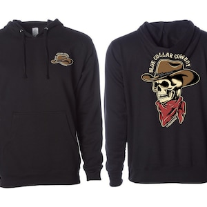 May include: Black hoodie with a front pocket and drawstring hood. The front features a small graphic of a cowboy hat. The back displays a skull wearing a cowboy hat and red bandana, with the text "BLUE COLLAR COWBOY".