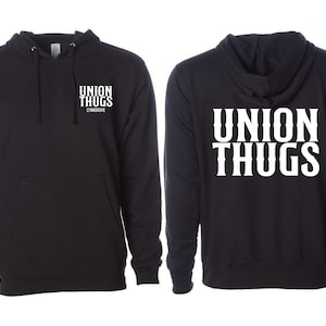 May include: Black hooded sweatshirt with white text that reads "UNION THUGS" on the front and back.