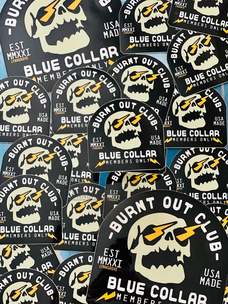 May include: A collection of black and yellow stickers with a skull graphic and the text "Burnt Out Club - Blue Collar - Members Only - Est. MMXXI - USA Made".