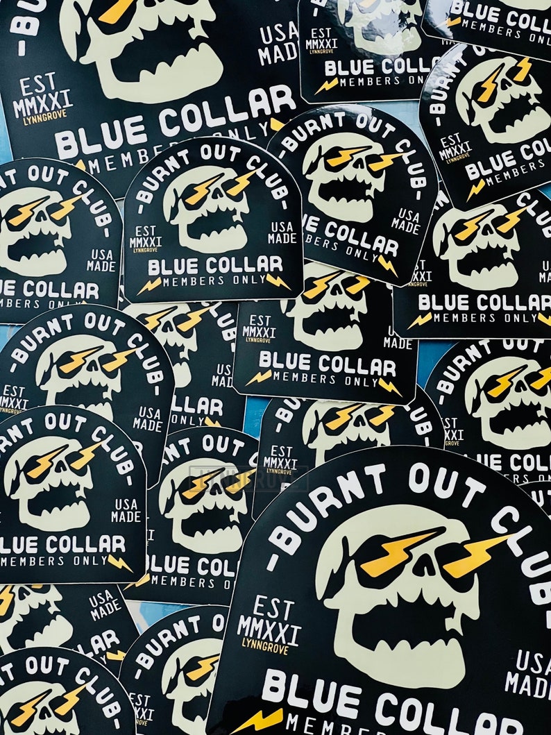 May include: A collection of black and white stickers with a skull graphic and the text "Burnt Out Club" and "Blue Collar Members Only".