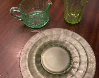 Gravy dish, juice cup and two tea plates