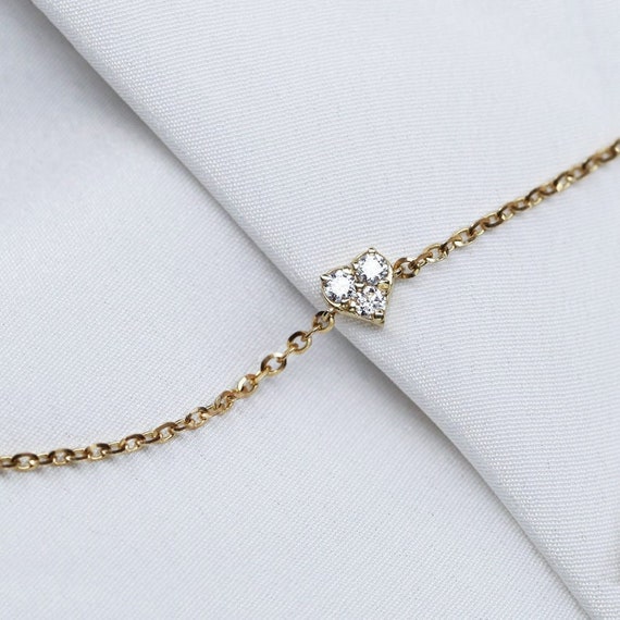 0.088 CT. T.W. Diamond Interlocking Double Elongated Heart