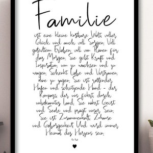May include: Black and white typography print with the word "Familie" in a large font at the top. The text below reads "is a small, precious world full of happiness and also full of worries. Full of shared experiences, full of hopes for tomorrow. It gives strength and inspiration to grow and dare. It gives love and trust without saying it. It is a safe haven and a protective hand - the compass that guides us through unknown territory. It nourishes the spirit and soul and shapes our being. It is unity. Home and security. And it will always be the home of the heart."