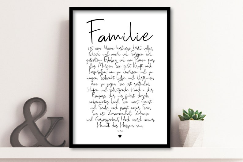 May include: Black and white printable wall art with a quote about family in German. The quote reads: "Familie ist eine kleine kostbare Welt voller Gl&uuml;ck und auch voll Sorgen. Voll gutem Erleben, voll von Haven f&uuml;r das Morgen. Sie gibt Kraft und Inspiration, um zu wachsen und zu wagen. Schenkt Liebe und Vertrauen,  dove you yagen. Sie ist rettender Hafen und sch&uuml;tzende Hand - der Kompass der uns f&uuml;hrt durch unbekanntes Land, sie n&auml;hrt Geist und Seele und pr&auml;gt unser Sein. Sie ist Zusammenhalt, Z'hause und Geborgenheit. Und wird immer Heimat des Herzens sein."