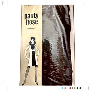 May include: A package of brown pantyhose with a black and white illustration of a woman wearing a dress and pantyhose. The package says "panty hose" and "seamless stretch".