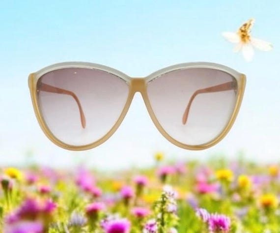 Vintage 1980s Silhouette Austria Sunglasses in a Yellow and 