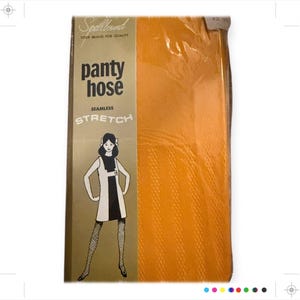 May include: A vintage package of Spellbound panty hose. The package is orange and features a black and white illustration of a woman wearing a mini dress and panty hose. The text on the package reads "Spellbound, Your Brand for Quality, Panty Hose, Seamless Stretch."