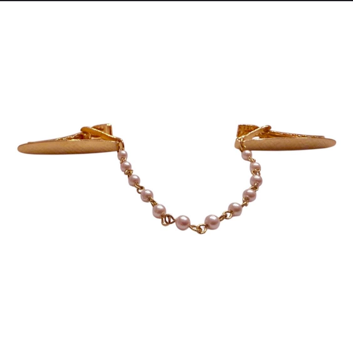 Ciondolo/spilla vintage in oro giallo 18K con cammeo su corallo aranci