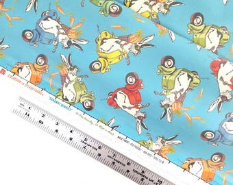 LAMINATED Cotton » Turquoise Bunny Fabric | Bunnies on Scooters Print Fabric | Oil Cloth By The 1/2 Yard |  Yardage | Eco-Friendly Fabric