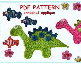 May include: PDF pattern for crocheting a dinosaur, two fish, and two flowers. The dinosaur is green with blue spots and a blue spine. The fish are blue, orange, and white. The flowers are pink and white.