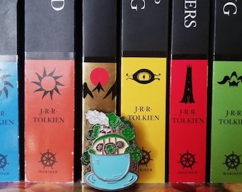 Casita en un pin de taza de té