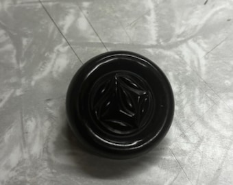 Black thick Bakelite shank button imprinted design floral like simichrome tested button collectors vintage great condition