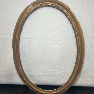 Antik Gesso på trä oval tavelram