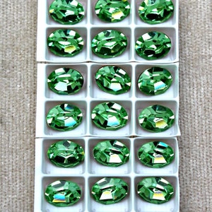 Swarovski vintage peridot oval 10x8mm ( 5 )
