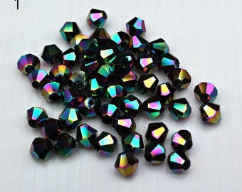 Glazen bicones met ab-afwerking 6 mm (50 kralen)