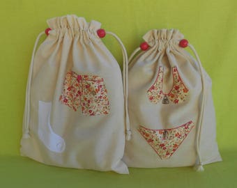 Set of 2 assorted men's/women's ecru canvas lingerie bags with floral cotton appliqué