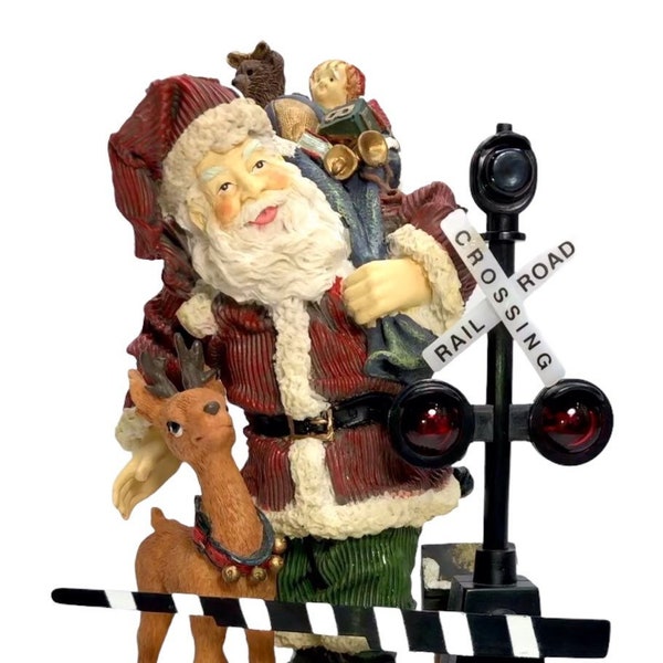 Train Enthusiasts Rejoice: Vintage Santa Figurine with Bag of Toys at Railroad Crossing, Equipped with Sound and Flashing Lights!