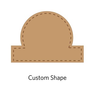 May include: A brown custom shape with a rounded top and a rectangular bottom. The shape has a dashed line border.