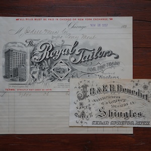 2 hermosas cabezas de toro vintage con gran tipografía