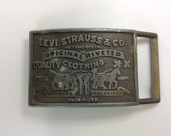 levi garrett belt buckle