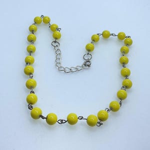 Vintage 18” Silver Toned Necklace With Yellow Plastic Beads Used