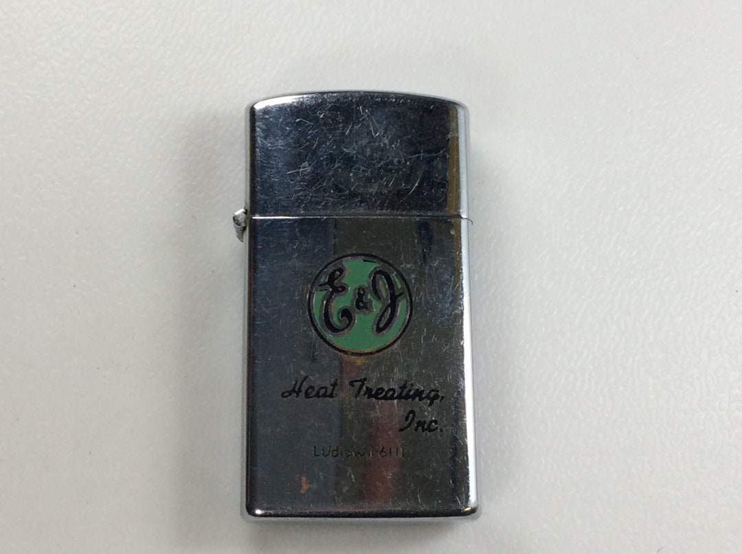 Vintage Penguin High Quality Lighter E and J Heat Treating