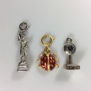 Vintage Lot Of Three Charms Silver Gold Toned Statue Of Liberty Lady Bug And Tops Weight Scales Used