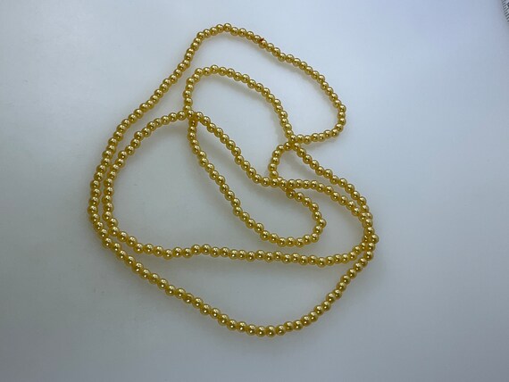 Vintage 34” Necklace With Yellow Pearly Beads Used - image 1