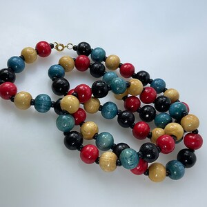 Vintage 28” Necklace With Wood Beads Black Red Blue And Natural Used