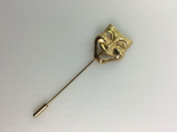 Stick outlet pin brooch